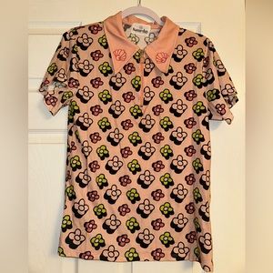 Saturday by Megan Ellaby retro floral Margot polo top